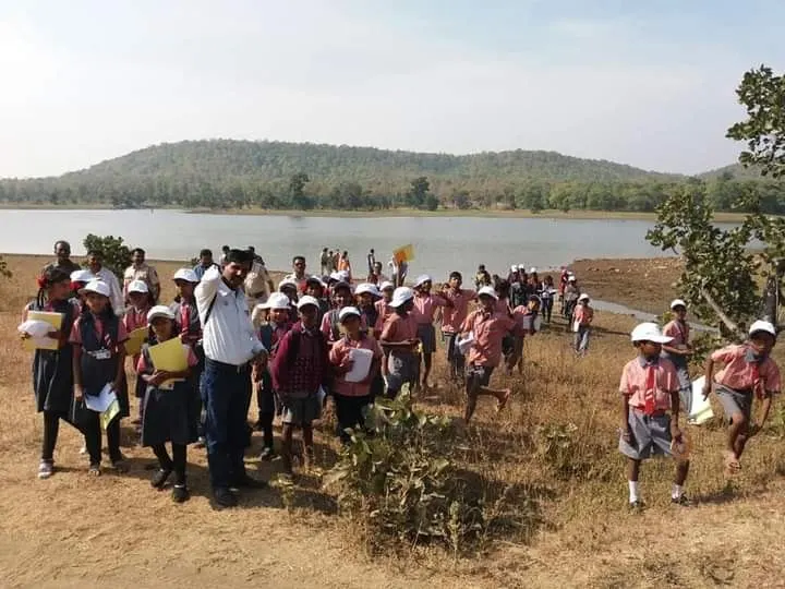 Students on a nature trail during a nature camp.